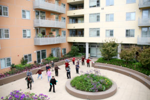 seniors doing tai chi at a Mercy Housing property in California