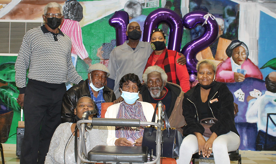 Mary Dorman posing with family